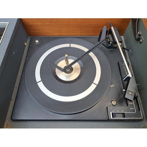 547 - A vintage Fidelity R.G. 35 stereo radiogram fitted with BSR three-speed autochanger turntable and Fi... 