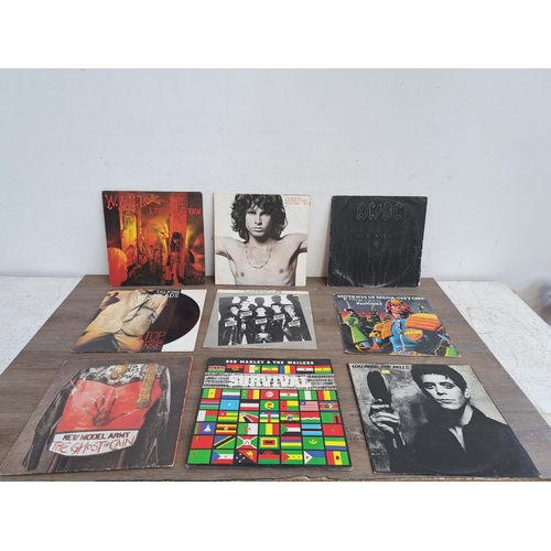 549 - A collection of LP vinyl records to include Deep Purple, Pink Floyd, Sex Pistols, Manowar, Megadeth,... 