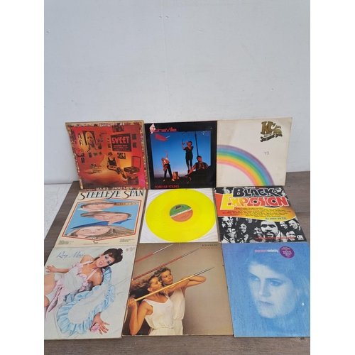 554 - A collection of vinyl records to include Elton John picture disc, Steeleye Span, Roxy Music, Alison ... 