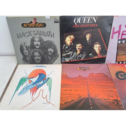 555 - Eleven rock LP vinyl records to include Black Sabbath, Queen, Jimi Hendrix, The Eagles, The Rolling ... 