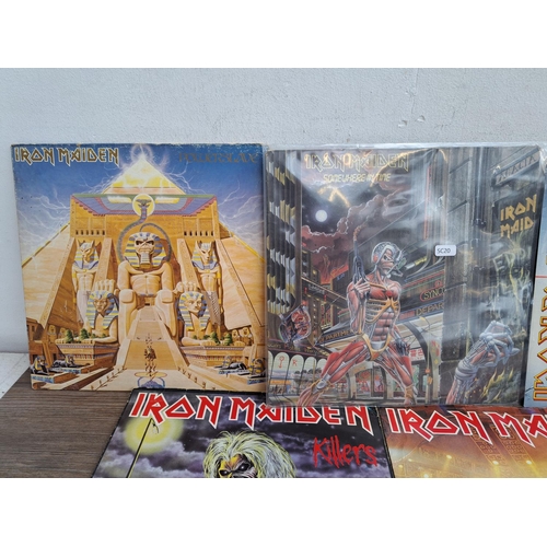 556 - Ten Iron Maiden vinyl records to include Somewhere in Time, Powerslave, Killers, Iron Maiden, Piece ... 