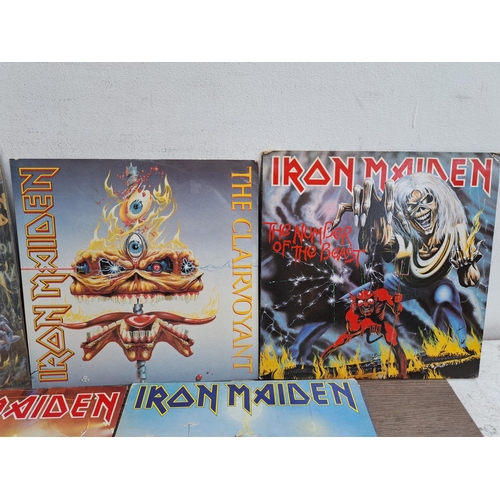 556 - Ten Iron Maiden vinyl records to include Somewhere in Time, Powerslave, Killers, Iron Maiden, Piece ... 