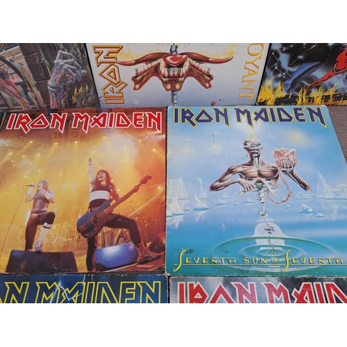 556 - Ten Iron Maiden vinyl records to include Somewhere in Time, Powerslave, Killers, Iron Maiden, Piece ... 