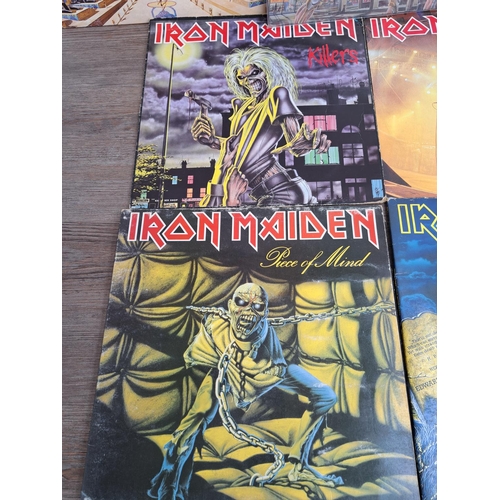 556 - Ten Iron Maiden vinyl records to include Somewhere in Time, Powerslave, Killers, Iron Maiden, Piece ... 