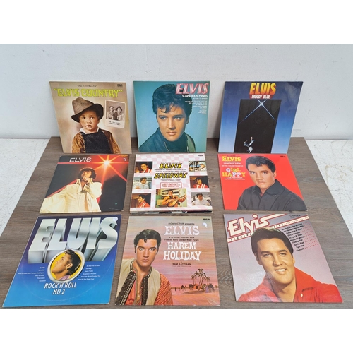 565 - A collection of twenty-three Elvis Presley LP vinyl records