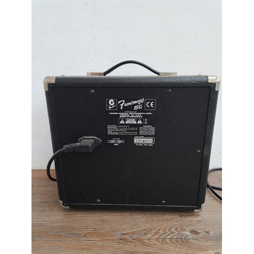 567 - A Fender Frontman 15G 15w electric guitar practise amplifier