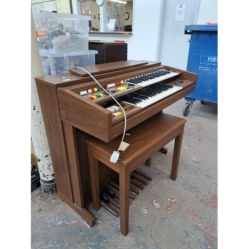 568A - A Yamaha Electone A-55N electric organ with stool