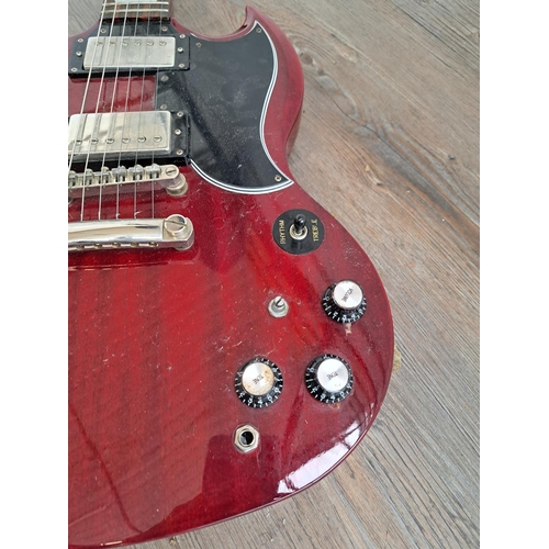 571 - An Epiphone SG electric guitar