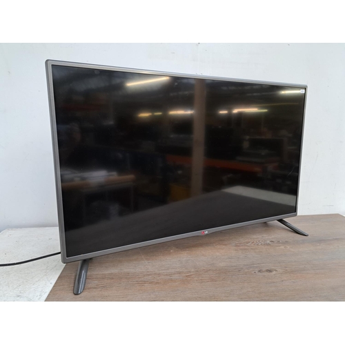 595 - Two TVs, one LG 42LB561V 42