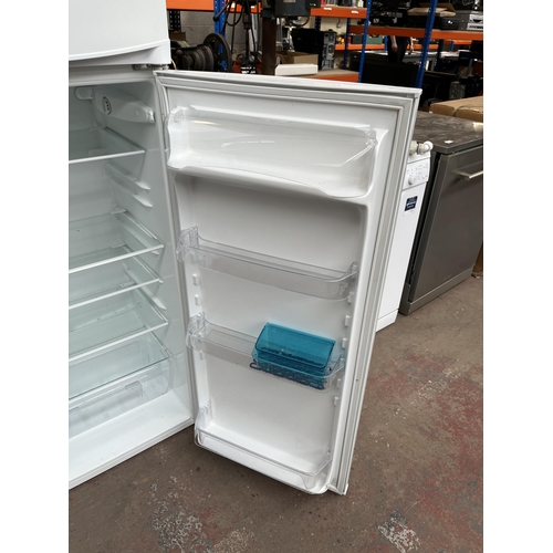 670 - A Zanussi upright fridge/freezer - approx. 159cm high