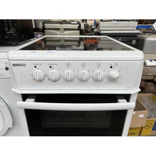 675D - A Beko DVC563A double oven 50cm electric cooker