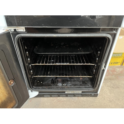 675D - A Beko DVC563A double oven 50cm electric cooker