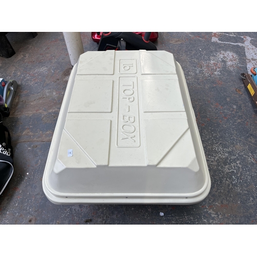 699 - An LB Top-Box roof rack storage box with a pair of Ford roof racks