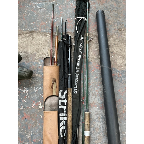 705 - Five pieces of fishing equipment, four vintage rods and one telescopic triangular net