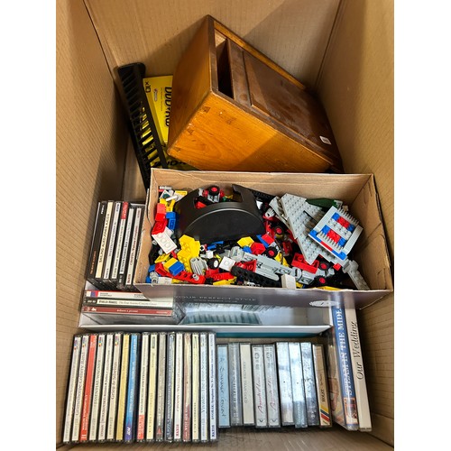 914 - Four boxes containing brass fire companion set, oil on board signed lower right, Lego, Newhall Fortu... 