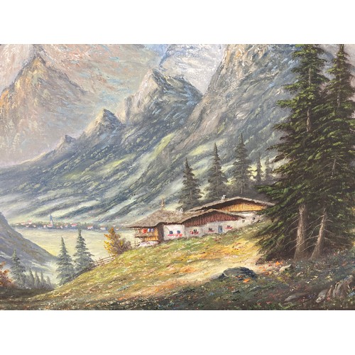 206 - A framed oil on canvas of a mountain scene, signed lower left - approx. 72cm high x 93cm wide