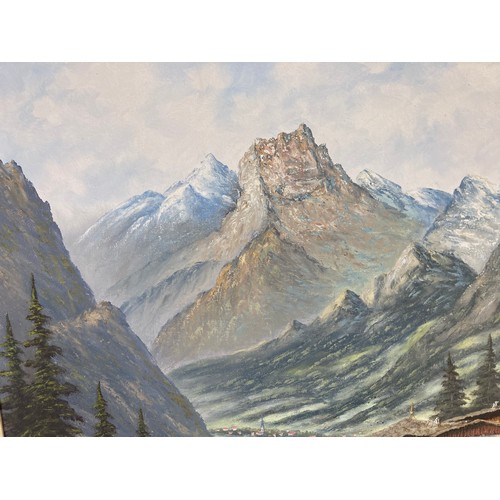 206 - A framed oil on canvas of a mountain scene, signed lower left - approx. 72cm high x 93cm wide