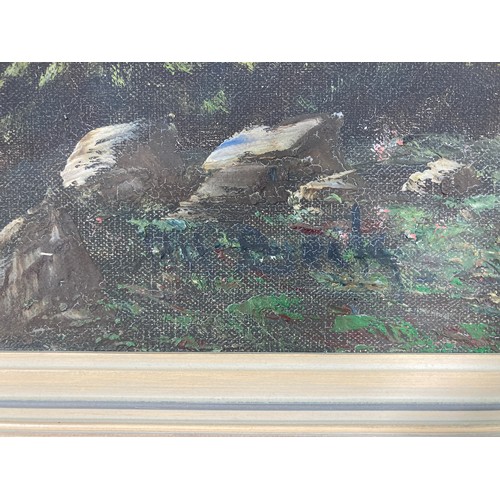 206 - A framed oil on canvas of a mountain scene, signed lower left - approx. 72cm high x 93cm wide