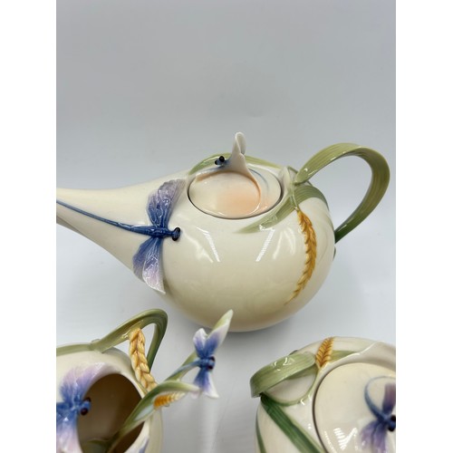 263 - Three pieces of boxed Franz Dragonfly porcelain designed by Jen Woo, teapot, sugar jar and cream jug