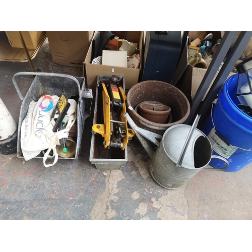 845 - A collection of house clearance items to include vintage galvanised watering can, brushed steel and ... 