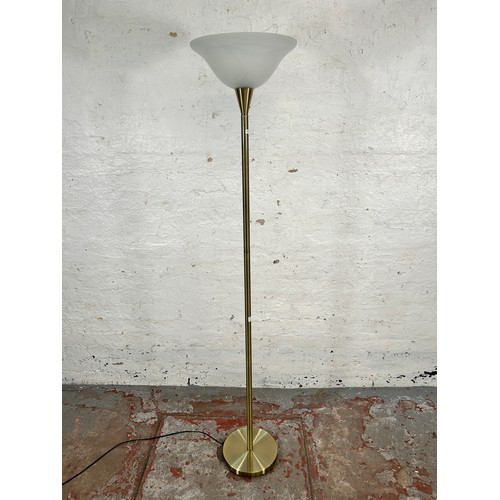 859 - Ten table lamps and one standard lamp to include Himalayan salt rock lamp, brass effect etc.