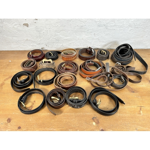 434 - A collection of men's leather belts to include Levi, Ralph Lauren, Coach etc.