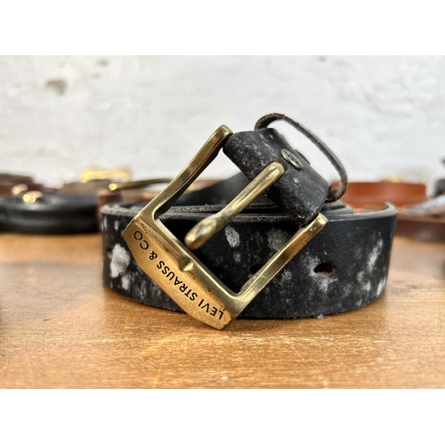 434 - A collection of men's leather belts to include Levi, Ralph Lauren, Coach etc.