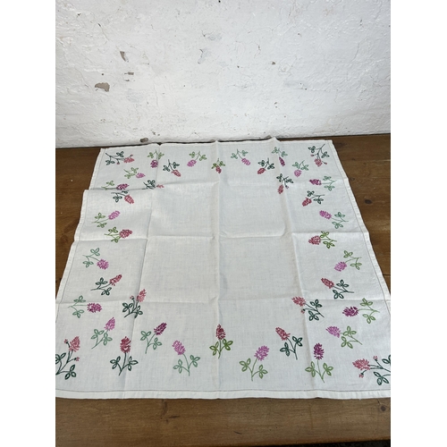 435 - A collection of embroidered and lace table linen