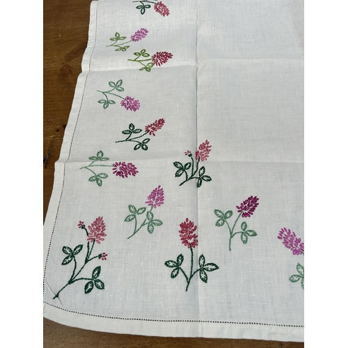 435 - A collection of embroidered and lace table linen