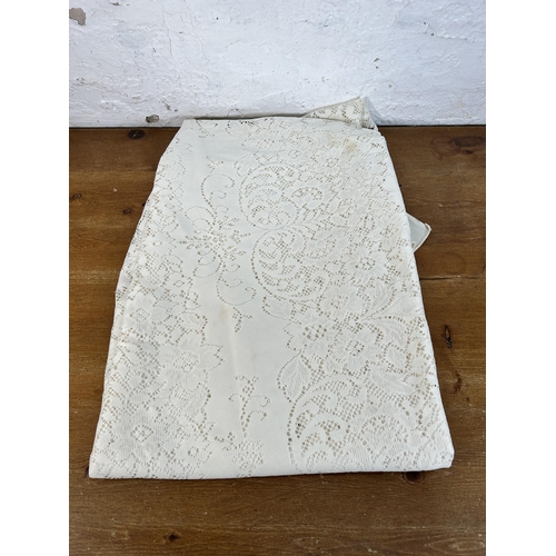 436 - A collection of embroidered and lace table linen