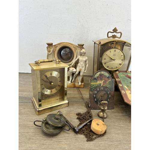519 - A collection of early/mid 20th century clocks to include German hand painted porcelain, Schatz 400 e... 