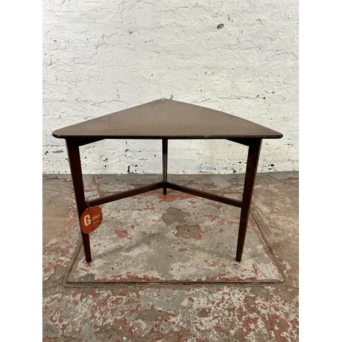 40 - A 1960s G Plan model 8015 tola wood triangular coffee table - approx. 49cm high x 66cm wide x 59cm d... 