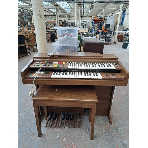 649A - A Yamaha Electone A-55N electric organ with stool