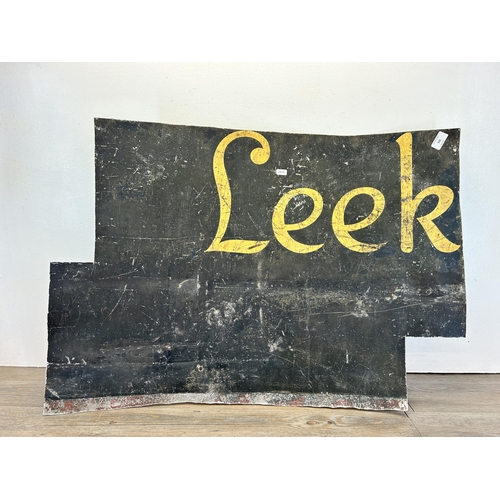 433 - An early/mid 20th century metal 'Leek' sign - approx. 62cm high x 90cm wide