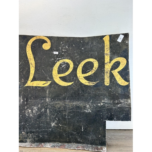 433 - An early/mid 20th century metal 'Leek' sign - approx. 62cm high x 90cm wide