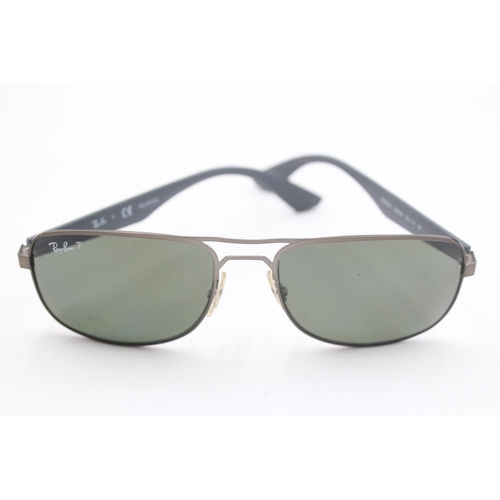 2430 - A pair of cased Ray-Ban grey sunglasses