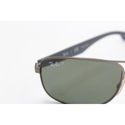 2430 - A pair of cased Ray-Ban grey sunglasses