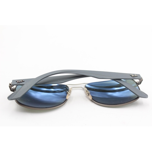 2430 - A pair of cased Ray-Ban grey sunglasses