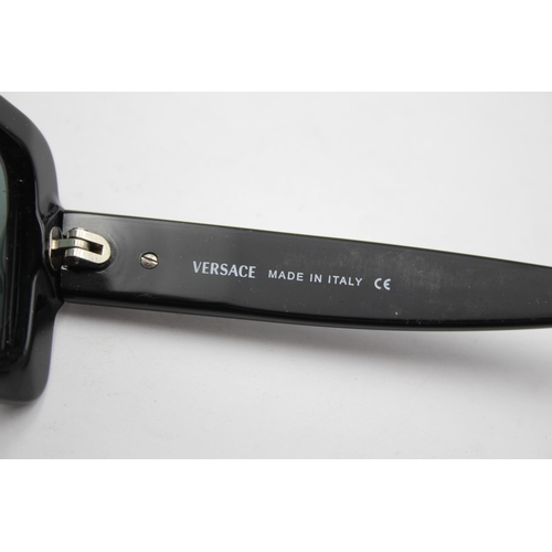 2433 - A pair of cased Versace black oversized sunglasses