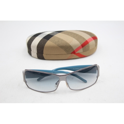 2435 - A pair of cased Burberry blue and grey tinted sunglasses