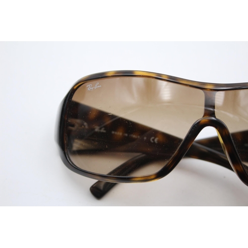 2436 - A pair of cased Ray-Ban visor style tortoiseshell effect sunglasses