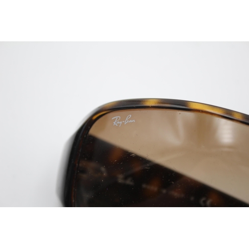 2436 - A pair of cased Ray-Ban visor style tortoiseshell effect sunglasses