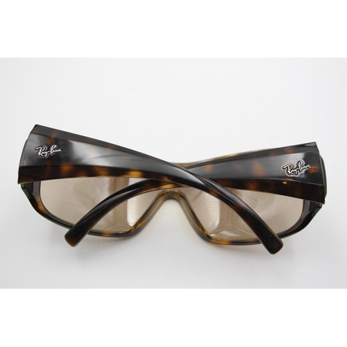 2436 - A pair of cased Ray-Ban visor style tortoiseshell effect sunglasses