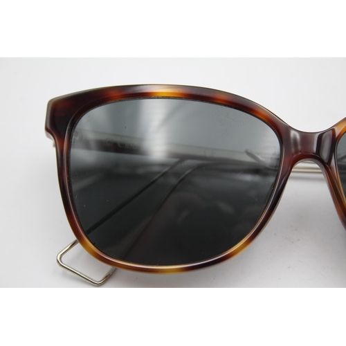 2437 - A pair of Dior tortoiseshell effect sunglasses