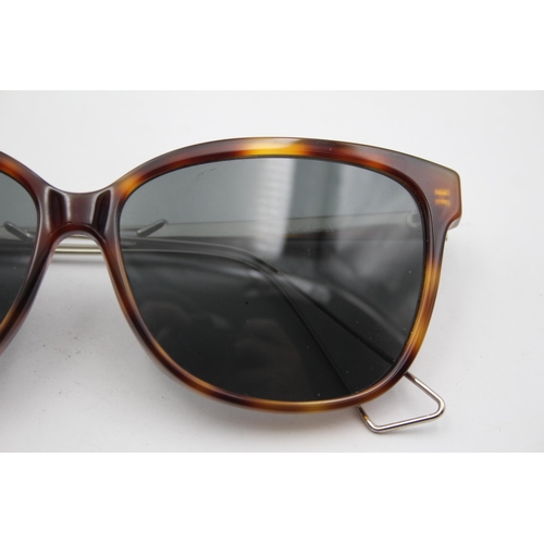 2437 - A pair of Dior tortoiseshell effect sunglasses