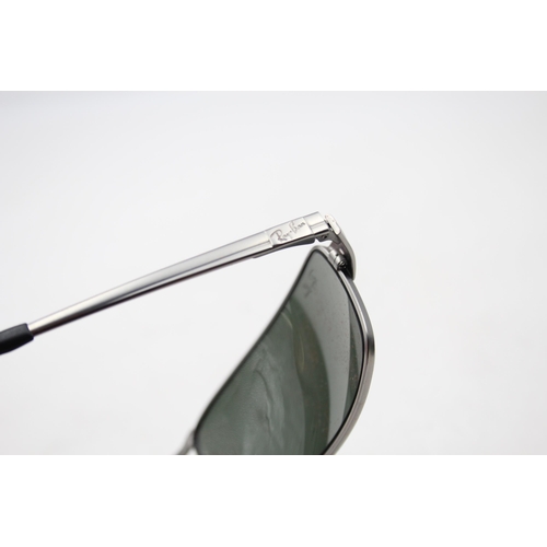 2438 - A pair of cased Ray-Ban grey sunglasses