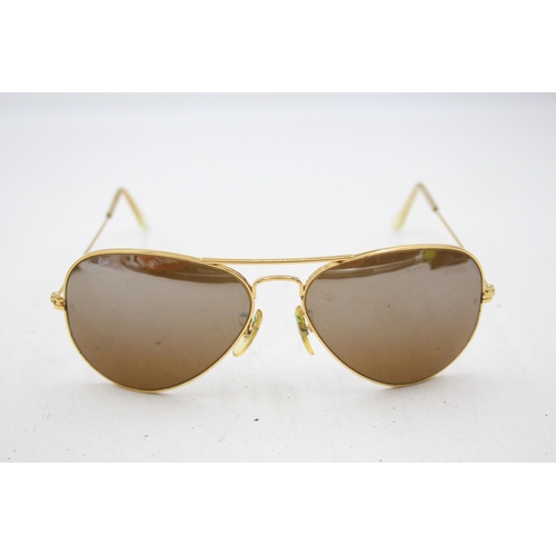 2440 - A pair of cased Bausch & Lomb Ray-Ban Aviator gold tone sunglasses