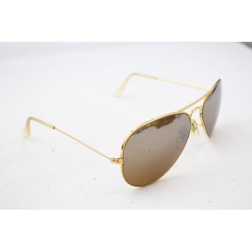 2440 - A pair of cased Bausch & Lomb Ray-Ban Aviator gold tone sunglasses