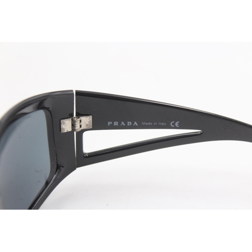 2441 - A pair of cased Prada black oversized sunglasses