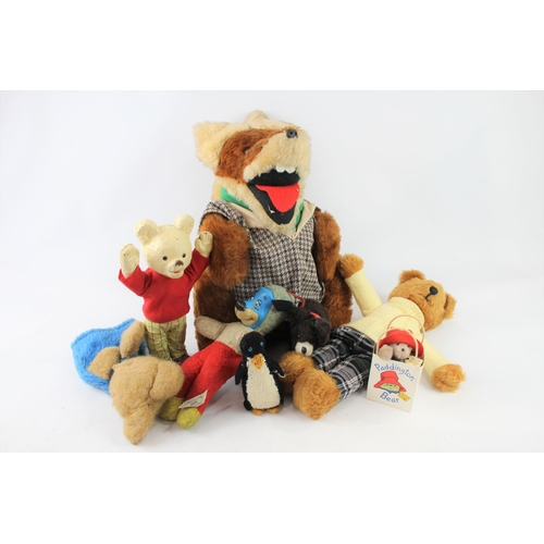 438 - Eight vintage soft toys to include Basil Brush, Rupert Bear, Paddington etc.